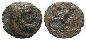 Asia Minor, Uncertain, c. 2nd-1st century BC. Æ Tessera(?) (17mm, 1.82g, 12h). Bearded head of Herakles r. R/ Erotic scene(?): rampant goat r. before ...