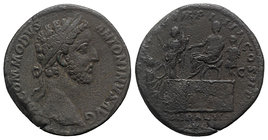 Commodus (177-192). Æ Sestertius (30mm, 21.91g, 12h). Rome, AD 180. Laureate head r. R/ Commodus seated l. on curule chair set on platform, extending ...