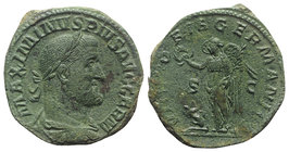 Maximinus I (235-238). Æ Sestertius (32mm, 22.04g, 12h). Rome, 236-7. Laureate, draped and cuirassed bust r. R/ Victory standing l., holding wreath an...