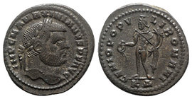 Maximianus (286-305). Æ Follis (28.5mm, 12.71g, 6h). Cyzicus, 295-6. Laureate head r. R/ Genius standing l., holding patera from which liquor flows an...