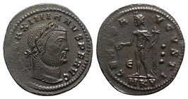 Galerius (305-311). Æ Follis (27mm, 7.04g, 6h). Cyzicus, c. AD 311. Laureate head r. R/ Genius standing l., holding patera and cornucopia; Є-three pel...