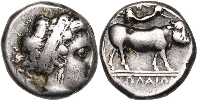 CAMPANIE, NOLA, AR didrachme, 400-385 av. J.-C. D/ T. de nymphe à d., les cheveu...