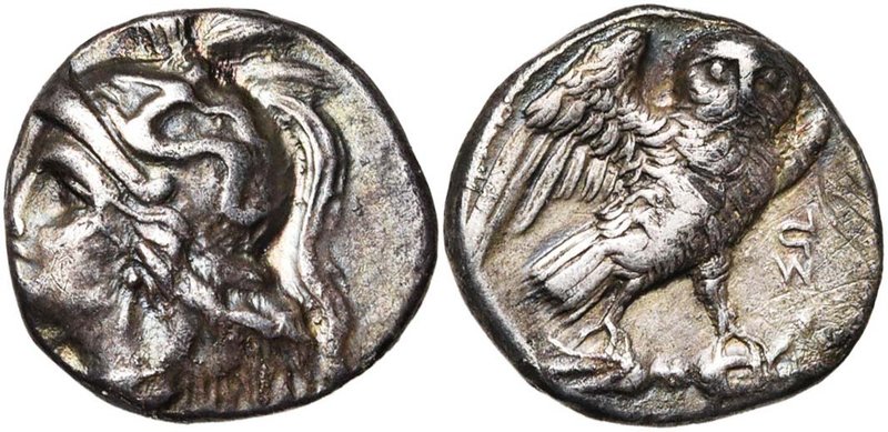 CALABRE, TARENTE, AR drachme, vers 280-272 av. J.-C. D/ T. casquée d'Athéna à g....