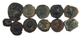 Lote formado por 7 divisores ibéricos y 4 bronces de Massalia. Total 11 monedas. RC/MBC-.