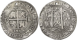 1657. Felipe IV. Potosí. E. 8 reales. (Cal. 418) (Lázaro 149). 26,73 g. Redonda. Tipo "real". Triple fecha. En anverso, Granada arriba. Sin PH en reve...