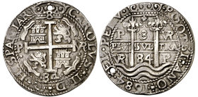 1684. Carlos II. Potosí. VR. 8 reales. (Cal. 322) (Lázaro 212-213 sim). 26 g. Redonda. Tipo "real". Triple fecha. Perforación. Muy bella. Ex Colección...