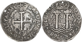 1687. Carlos II. Potosí. VR. 8 reales. (Cal. 325) (Lázaro 221). 26,53 g. Redonda. Tipo "real". Triple fecha. Perforación. Muy rara. MBC+.