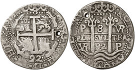1692. Carlos II. Potosí. VR. 8 reales. (Cal. 380) (Lázaro 230). 27,84 g. Redonda. Tipo "real". Triple fecha. Perforación. Ex Áureo 28/06/1990, nº 716....