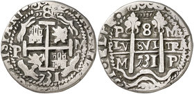1731. Felipe V. Potosí. M. 8 reales. (Cal. 829) (Lázaro 279). 26,30 g. Redona. Tipo "real". Triple fecha, una parcial. Todos los ejemplares de ese año...