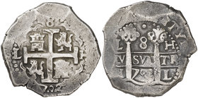 1702. Felipe V. Lima. H. 8 reales. (Cal. 624). 27,27 g. Doble fecha. Rara. MBC+.