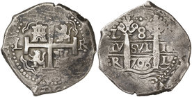 1706. Felipe V. Lima. R. 8 reales. (Cal. 629). 26,27 g. Doble fecha, una parcial. Este ensayador, Leonardo de Rojas, sólo acuñó en esta ceca y durante...
