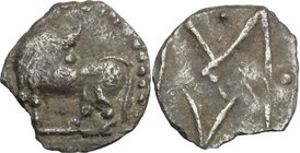 Greek Italy. Southern Lucania, Sybaris. AR Obol, 550-510 BC. D/ Bull standing left, head right; V M in exergue. R/ Large M/V; four pellets around. HN ...