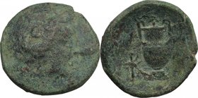 Greek Italy. Bruttium, Hipponium. AE 19 mm, second half of 4th century, or early 3rd century. D/ Head of Zeus right. R/ Amphora; to left, symbol. HN I...