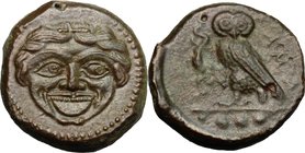 Sicily. Kamarina. AE Tetras, c. 420-405 BC. D/ Gorgoneion. R/ KAMA. Owl standing left, head facing, grasping lizard; in exergue, three pellets. CNS 21...