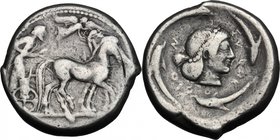 Sicily. Syracuse. Deinomenid Tyranny (485-466 BC). AR Tetradrachm. D/ Charioteer driving quadriga right, holding kentron and reins; above, Nike flying...