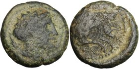Sicily. Uncertain mint. AE 20 mm. c. 350-300 BC. D/ Laureate male head right (Apollo?). R/ [...]ΑΙΝΩΝ. Forepart of man-headed bull swimming right. AE....