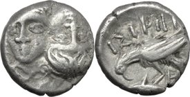 Continental Greece. Moesia, Istros. AR Quarter Drachm, 4th century BC. D/ Facing male heads, the right inverted. R/ ΙΣTPIH. Sea-eagle, on dolphin left...