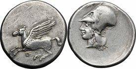 Continental Greece. Corinthia, Corinth. AR Stater, c. 400-375 BC. D/ Pegasos flying left; below, koppa. R/ Helmeted head of Athena left; no symbols or...
