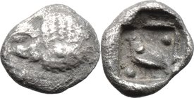 Greek Asia. Ionia, uncertain mint. AR 1/48 Stater, 6th century BC. D/ Head of lion right. R/ Symbol within incuse square. Von Aulock 1818. AR. g. 0.23...
