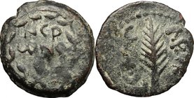 Greek Asia. Judaea. Porcius Festus, Procurator. AE Prutah in the name of Nero, 58-59 AD, Jerusalem mint. D/ NЄP/ωNO/C in three lines within wreath. R/...