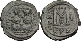 Justin II (565-578). AE Follis, Cyzicus mint. D/ DN IVSTINVS PP AV[ ]. Justin and Sophia seated facing; between their heads, cross. R/ Large M between...