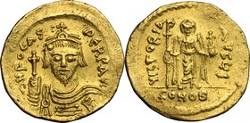 Phocas (602-610). AV Solidus, Constantinople mint. D/ dN FOCAS PЄRP AVG. Draped and cuirassed bust facing, wearing crown and holding globus cruciger. ...