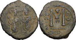 Arab-byzantine, Umayyad Caliphate, pre-reform coinage. AE Fals, Baalbek mint, 41-77 H / 661-697 AD. D/ Byzantine emperor and son, facing. R/ Large M. ...