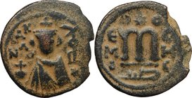 Arab-byzantine, Umayyad Caliphate, pre-reform coinage. AE Fals, Emesa mint, 41-77 H / 661-697 AD. D/ Facing bust of Byzantine emperor, holding globus ...