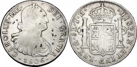 Mexico. Charles IV (1788-1808). Chopmarked 8 Reales 1806 TH, Mexico City. Host coin KM 109. AR. g. 26.73 mm. 40.50 RR. Good VF. Chop marks on coins ar...