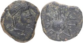 Siglo II-I aC. Carbula, Almodobar del Río (Cordoba). As. AB.444. LV-4. Ae. 11,71 g. Cabeza de Apolo a derecha, detrás letra ibérica Ta y delante símbo...