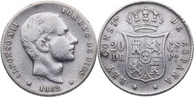 1882. Alfonso XII (1874-1885). Manila. 20 Centavos de Peso. Cy 17550. Ag. 5,03 g. Escasa. BC . Est.30.