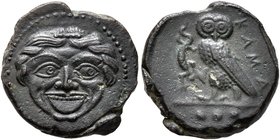 SICILY. Kamarina. Circa 420-405 BC. Tetras (Bronze, 14 mm, 3.00 g, 12 h). Facing gorgoneion with protruding tongue. Rev. KAMA Owl standing left, head ...