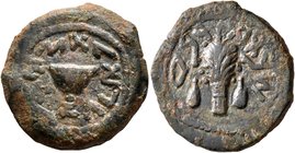 JUDAEA, First Jewish War. 66-70 CE. 1/8 Shekel (Bronze, 20 mm, 5.71 g, 11 h), Year 4 = 69/70. Omer cup. Rev. Lulav bunch flanked by etrogs. Hendin 136...