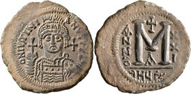 Justinian I, 527-565. Follis (Bronze, 39 mm, 18.32 g, 5 h), Theoupolis (Antiochia), RY 21 = 547/8. D N IVSTINI-ANVS P P AVI Helmeted and cuirassed bus...