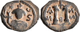 ISLAMIC, Time of the Rashidun. Pseudo-Byzantine types. Circa AH 37-55 / AD 658-675. Fals (Bronze, 23 mm, 5.43 g, 12 h), imitating a follis of Constans...