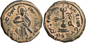 ISLAMIC, Umayyad Caliphate. temp. 'Abd al-Malik ibn Marwan, AH 65-86 / AD 685-705. Fals (Bronze, 21 mm, 3.27 g, 11 h), 'Standing Caliph' type, Hims, A...