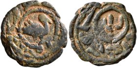 ISLAMIC, Umayyad Caliphate. Uncertain period (post-reform), AH 77-132 / AD 697-750. Fals (Bronze, 18 mm, 2.75 g, 11 h), uncertain mint in Bilad al-Sha...