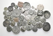 A lot containing 6 silver, 33 bronze coins, 1 bronze weight and 1 lead seal. Includes: Greek, Roman Provincial, Roman Imperial and Byzantine. Fine to ...