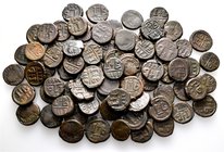 A lot containing 77 bronze coins. All: Byzantine Folles from Alexandria. About fine to about very fine. LOT SOLD AS IS, NO RETURNS. 77 coins in lot.