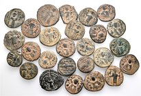 A lot containing 26 bronze coins. All: Arab-Byzantine Folles. About fine to very fine. LOT SOLD AS IS, NO RETURNS. 26 coins in lot.