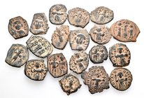 A lot containing 19 bronze coins. All: Arab-Byzantine. Fine to very fine. LOT SOLD AS IS, NO RETURNS. 19 coins in lot.