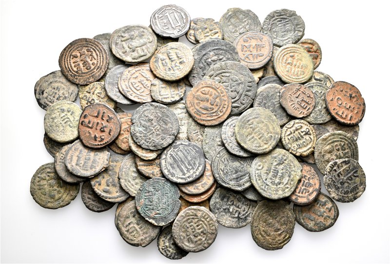 A lot containing 81 bronze coins. All: Islamic. Fine to very fine. LOT SOLD AS I...