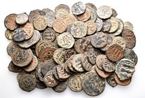 A lot containing 100 bronze coins. All: Islamic. Fine to good very fine. LOT SOLD AS IS, NO RETURNS. 100 coins in lot.