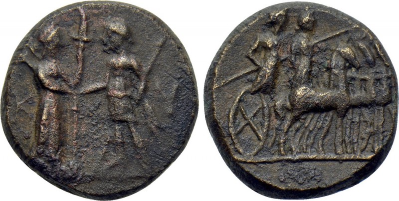 AEOLIS. Kyme. Ae (2nd century BC). 

Obv: K - V. 
Artemis standing right with...