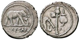ROMANE IMPERIALI - Giulio Cesare († 44 a.C.) - Denario - Elefante a d. calpesta il dragone /R Berretto a punta, scure, aspersorio e simpulum B. 9; Cr....