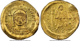 Justinian I the Great (AD 527-565). AV solidus (20mm, 4.46 gm, 6h). NGC MS 5/5 - 2/5, bent, scratches, edge scuffs. Constantinople, 5th officina. D N ...