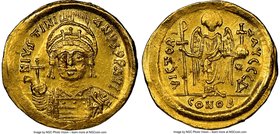 Justinian I the Great (AD 527-565). AV solidus (20mm, 4.49 gm, 7h). NGC MS 4/5 - 3/5, edge bends, clipped, adjusted flan. Constantinople, 4th officina...