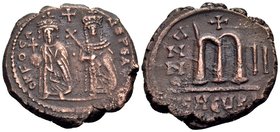 Phocas, 602-610. 40 Nummia or Follis (Copper, 26 mm, 10.74 g, 12 h), Theoupolis, year 2 = 603-4. D N FOCA NE PE AV To left, Phocas, crowned holding gl...