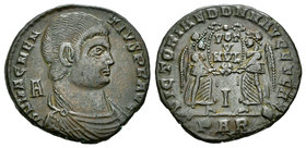 Magnentius. Centenional. 351-352 d.C. (Spink-18832). Rev.: VICT DD NN AVG ET CAES. dos victoria sosteniendo escudo con inscripción en 4 líneas, VOT / ...