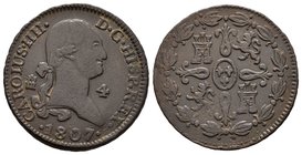 Charles IV (1788-1808). 4 maravedís. 1807. Segovia. Ae. 4,89 g. Dos puntos a la derecha de la fecha. Almost VF. Est...30,00.